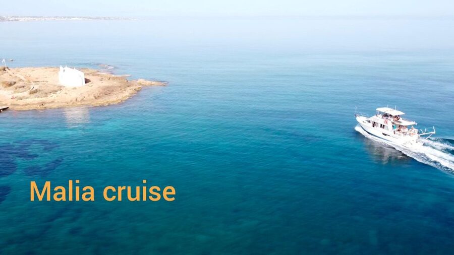 Crete: Snorkeling Boat Trip with Lunch and Transfer - The first swim stop: a quick splash and boat jump