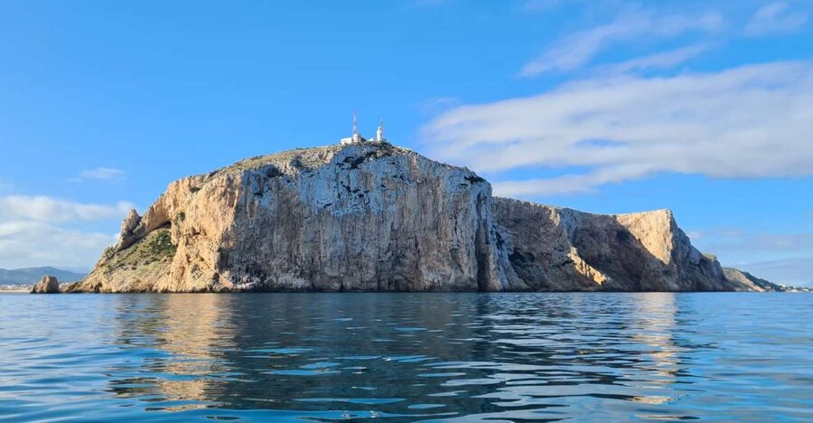 Denia: Cabo San Antonio Snorkeling Tour - Snorkeling beneath the Cabo de San Antonio lighthouse