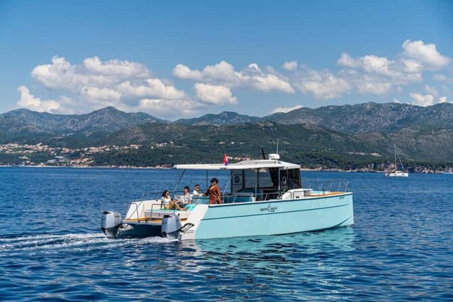 Dubrovnik: Blue Cave Catamaran Tour with Drinks and Snorkel - Blue Cave: light, shadow, and cool water