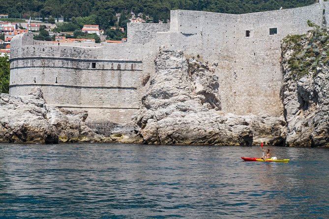Dubrovnik: Sunset Kayaking & Snorkeling with water &wine - Betina Cave and the rocky swim