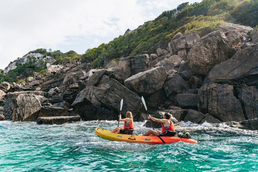 Es Figueral: Guided Kayaking and Snorkeling Tour - Entering Ses Mayoles sea cave