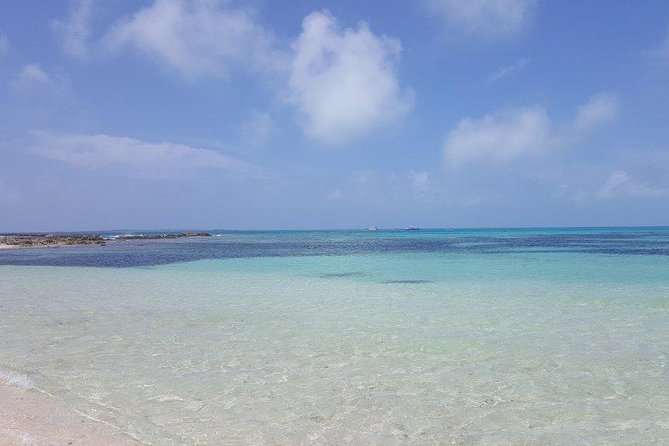 Exclusive Supreme Snorkeling Tour - Watching conch become lunch