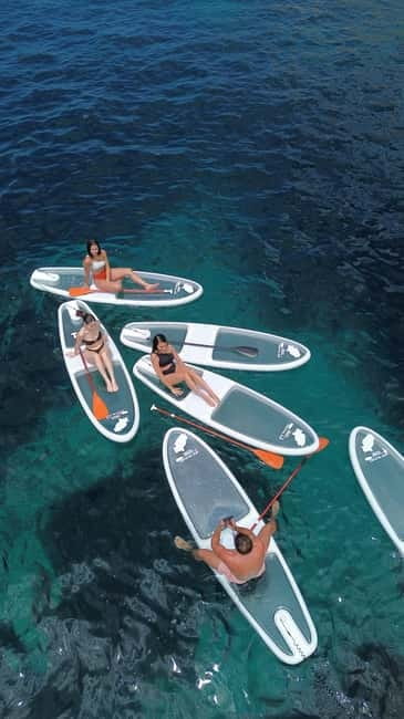 Experience Crystal paddle surf Tours + snorkel - Cala Llonga, coves, and the coast by paddleboard