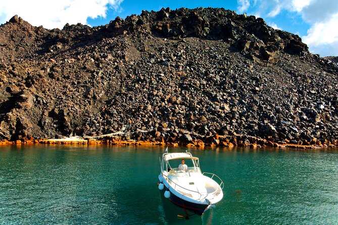 Explore Santorini and its volcanic wonders with Alex Private Boat - Greek food, wine, and a relaxed finish