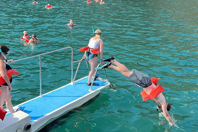 Flamingo Family Fun Catamaran Snorkel:Comfortable shaded seating - The waterslide and upper deck add real value