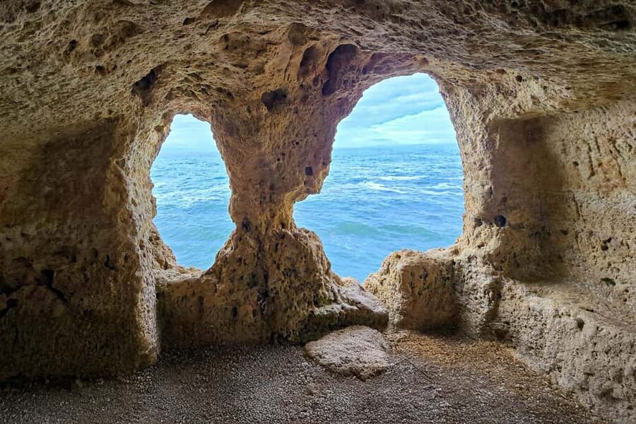From Faro: 7 Valleys Hiking, Benagil Cave, & Snorkeling Tour - Benagil Cave from the cliff top