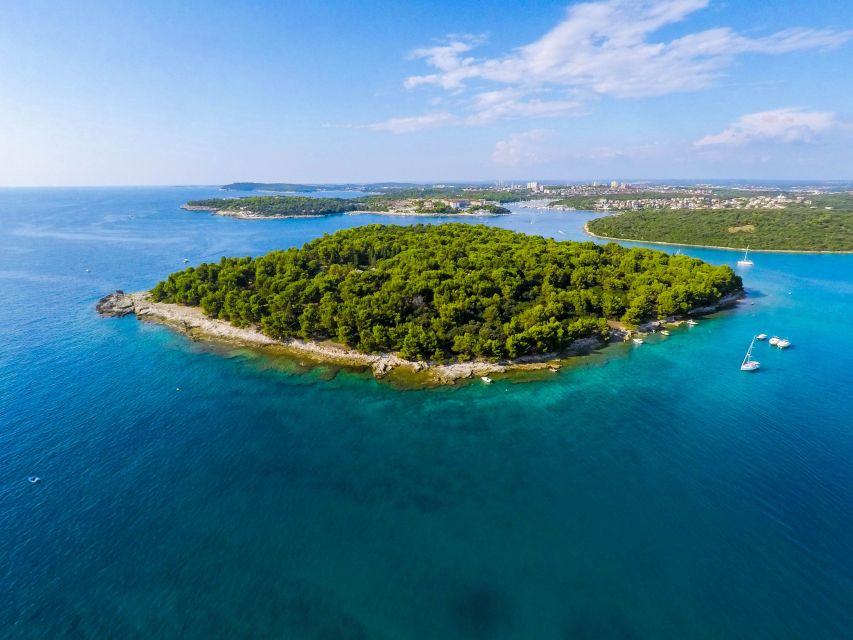 From Fazana: Dolphin watching and snorkeling in Blue Cave - A slower swim near Brijuni National Park