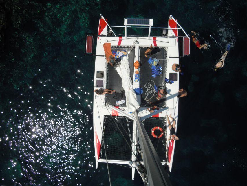 From Fornells: Half-Day Menorca Catamaran Trip w/ Snorkeling - Sailing without the usual engine noise