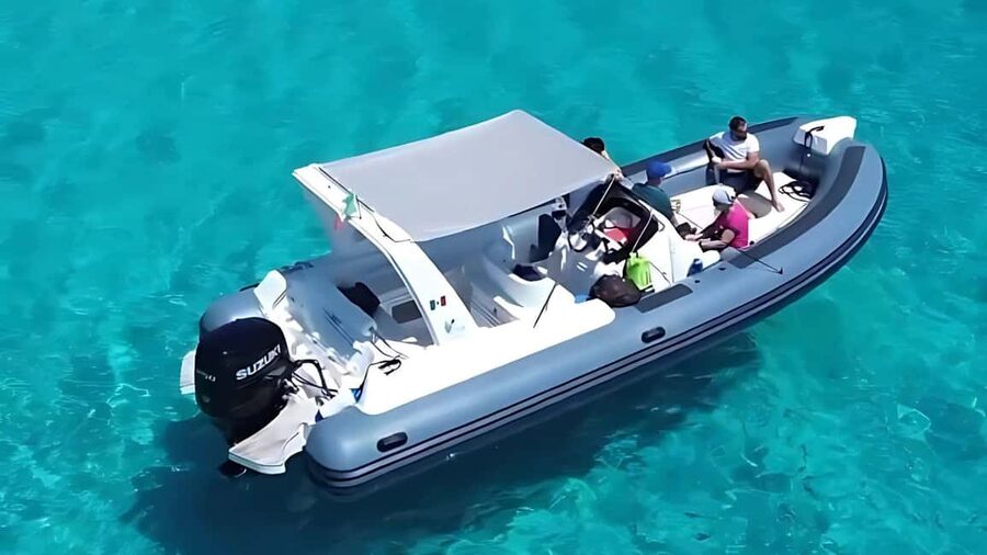 From Olbia: Dinghy Tour with Snorkeling to Tavolara Island - Tavolara viewed from the water