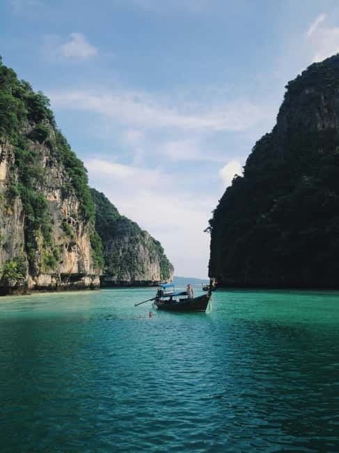 From Phi Phi: Maya Bay HalfDay Longtail Boat with Snorkeling - The 2 PM departure adds sunset and plankton