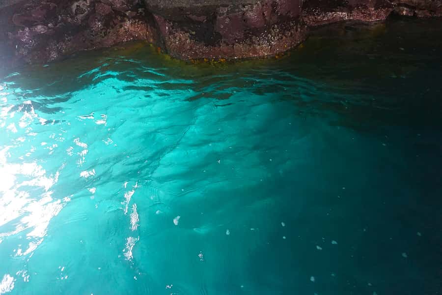 From Praia: Boat Trip, Snorkeling, Cave & BBQ on the Beach - How the guide and group size affect the day