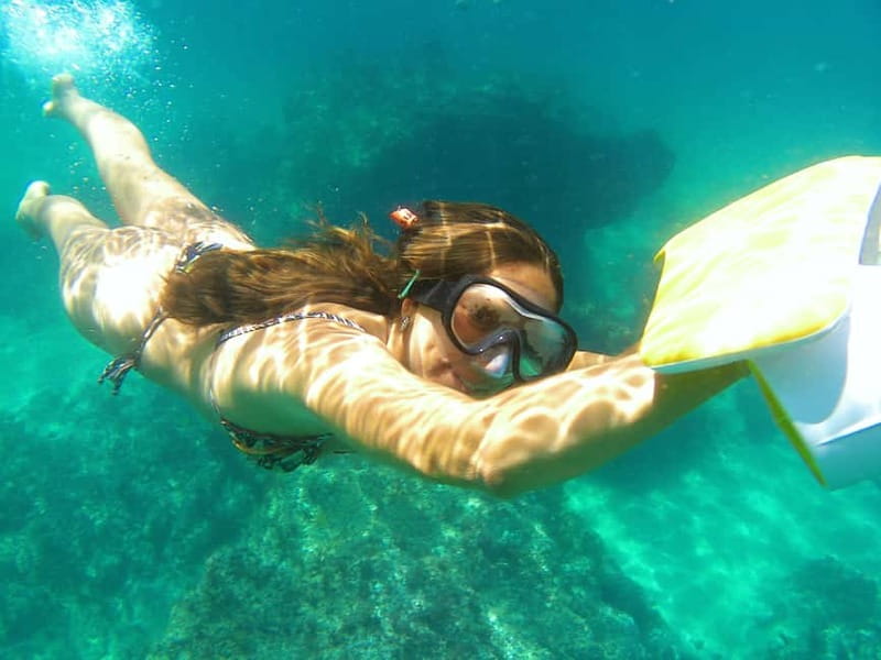 From Sesimbra: Sea Scooter Snorkeling boat Tour - A welcome drink after the water time