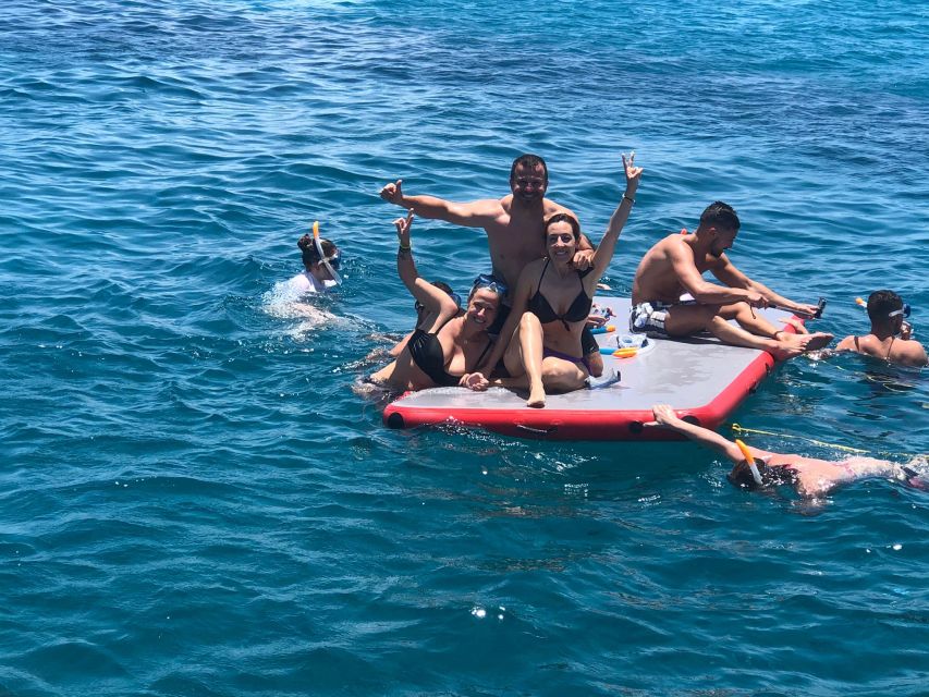 Fuerteventura: 1-Hour Mini Swim & Snorkel Cruise - Lobos Island: quiet beaches, rocks, and little shade