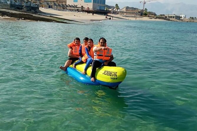 Full Day Musandam Cruise with Lunch and Snorkelling from Dubai - Banana boat and speedboat rides