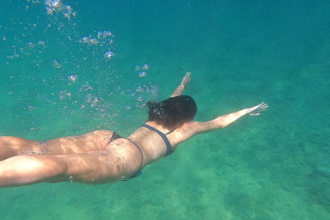 Guided Kayak & Snorkel tour to Costa Brava: Small Group and Lunch - Free GoPro photos are a useful extra