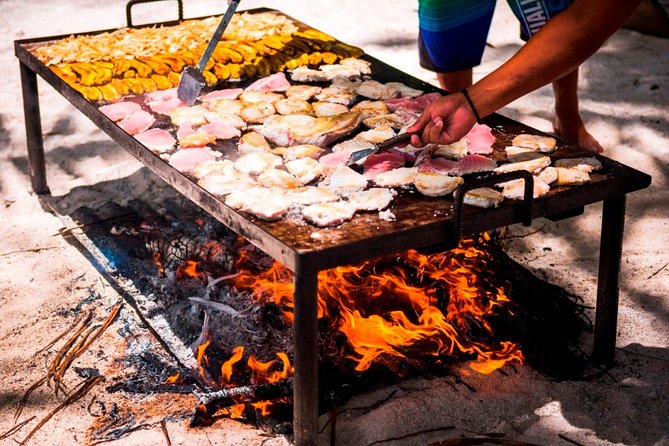 Half-Day Muri Lagoon BBQ Lunch Cruise including Snorkeling - Glass-bottom views before getting wet
