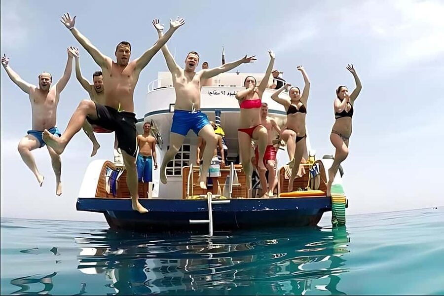 Hurghada: Dolphin Watching Boat Tour with Snorkeling & Lunch - Two snorkeling stops over Red Sea coral
