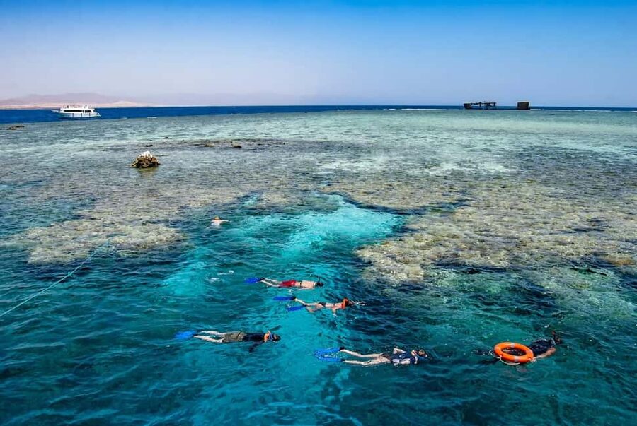 Hurghada: Dolphin Watching Boat Tour with Snorkeling & Lunch - Banana boat and sofa boat rides