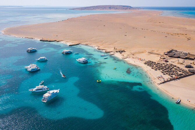 Hurghada: Orange Bay, Snorkeling, Watersports, Lunch & Drinks - Dolphins, coral, and what you may actually see