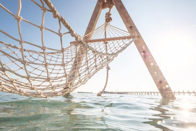 Hurghada: Orange Bay, Snorkeling, Watersports, Lunch & Drinks - Orange Bay, white sand, and a hot beach
