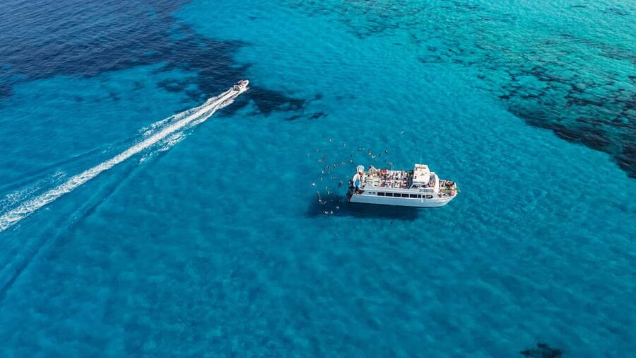Ibiza: Formentera Trip with Paddle, Snorkel and Lunch - Leaving Playa d’en Bossa and settling into the boat