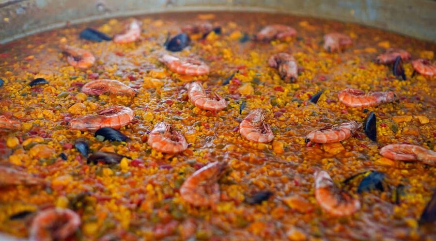 Ibiza: Formentera Trip with Paddle, Snorkel and Lunch - Paella lunch with beer, sangria, and salad