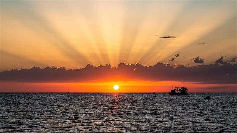 Ibiza: Snorkeling, Sunset Beach and Cave Boat Trip - Why the west coast works so well at sunset