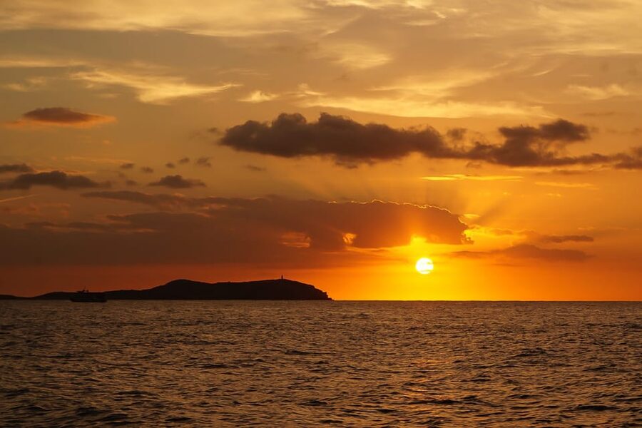 Ibiza: Sunset Boat Trip with Snorkeling, Kayaking, & Drinks - The main swim and paddleboard stop