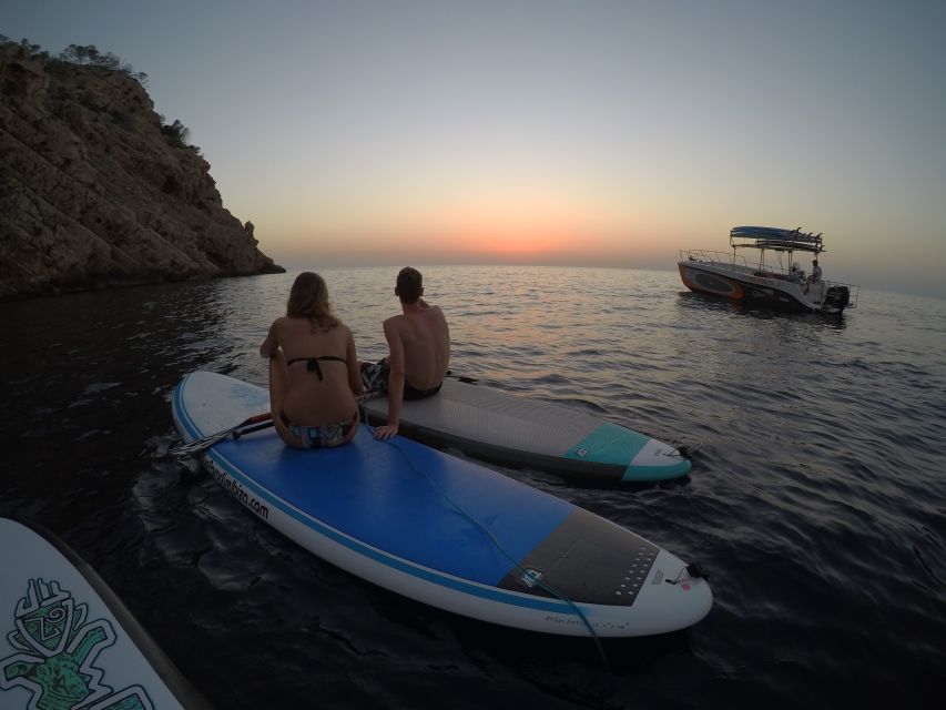 Ibiza: SUP & Snorkel Boat Tour with Caves, Drinks & Photos - Guided snorkeling in clear water