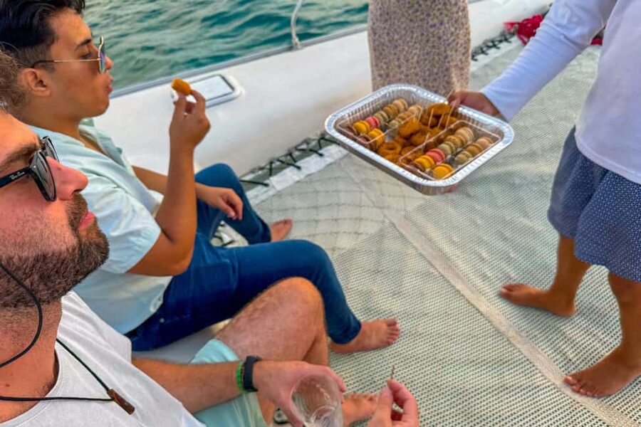 Isla Mujeres: Catamaran Ride with Open Bar, Snorkeling, and Lunch - The crew and the group atmosphere