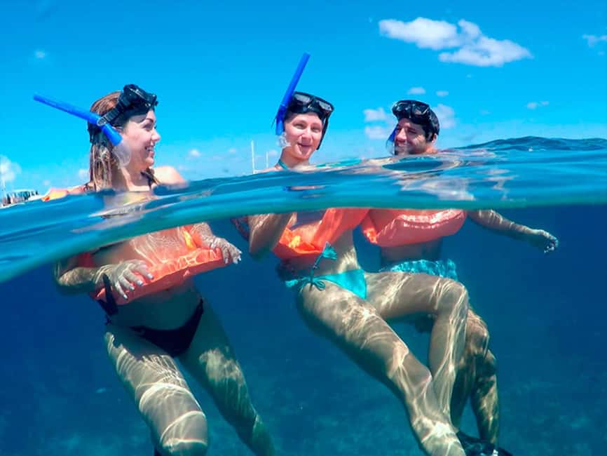 Isla Mujeres Catamaran Tour: Snorkel & Beach Adventure - Sailing out on a 40-foot catamaran