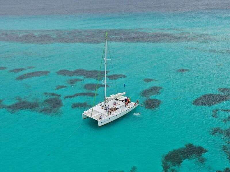Isla Mujeres Catamaran Tour: Snorkel & Beach Adventure - Lunch, open bar, and the beach-club stop