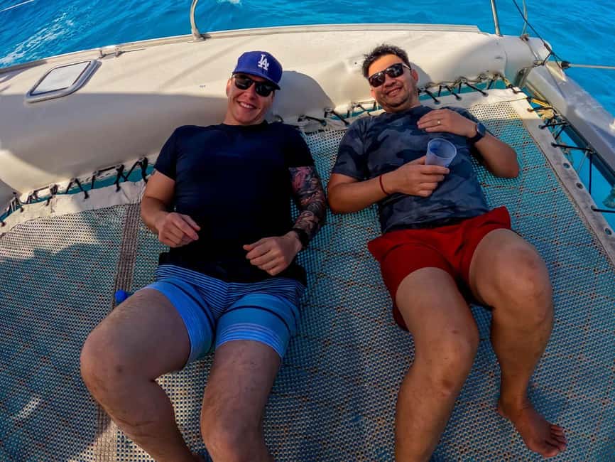 Isla Mujeres Catamaran Tour with Snorkeling & Open bar - Two hours for lunch, then one hour to explore