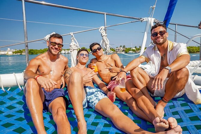 Isla Mujeres Cruise with Beach Club, Snorkel, Lunch and Open Bar - The return sail and the party atmosphere
