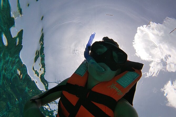 Isla Mujeres Snorkeling Adventure at the Underwater Museum - MUSA offers statues, a Beetle, and a limited view