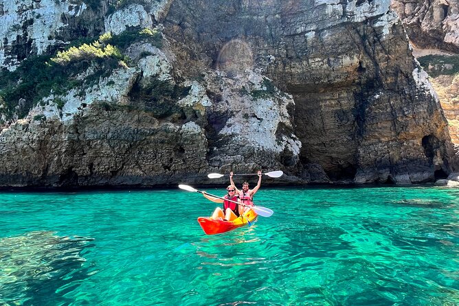 Kayak Paradise: Cala Portixol Snorkel, Cave & Cliff Jumping Tour - Cala el Pom, clear water and quiet rock formations