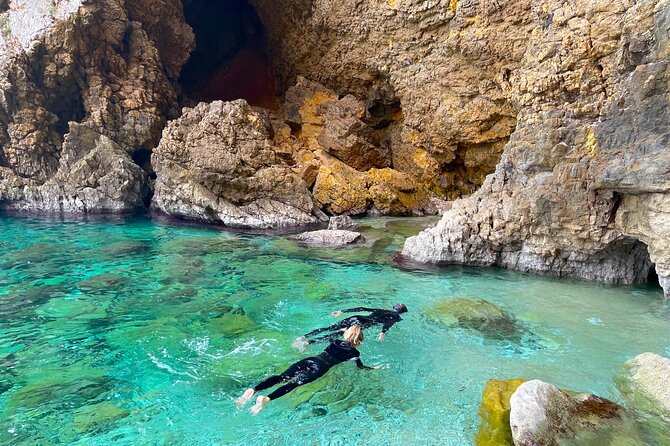 Kayak Paradise: Cala Portixol Snorkel, Cave & Cliff Jumping Tour - Why the small group helps families and beginners