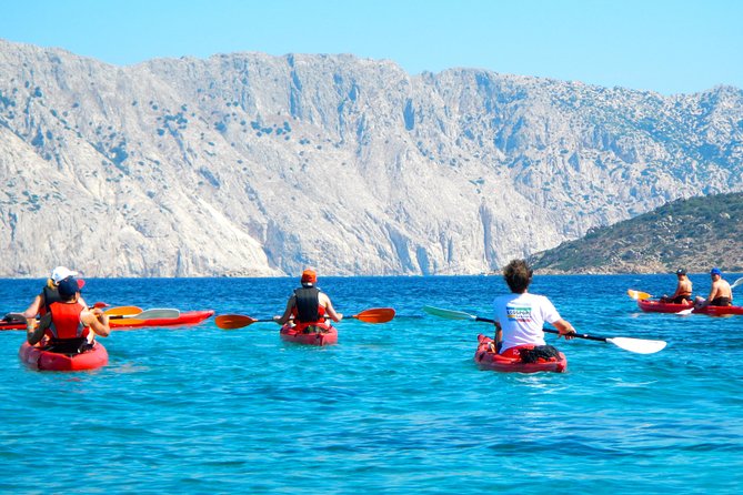 Kayak Tour with Snorkeling and Local Aperitif - Paddling through Tavolara and Punta Coda Cavallo