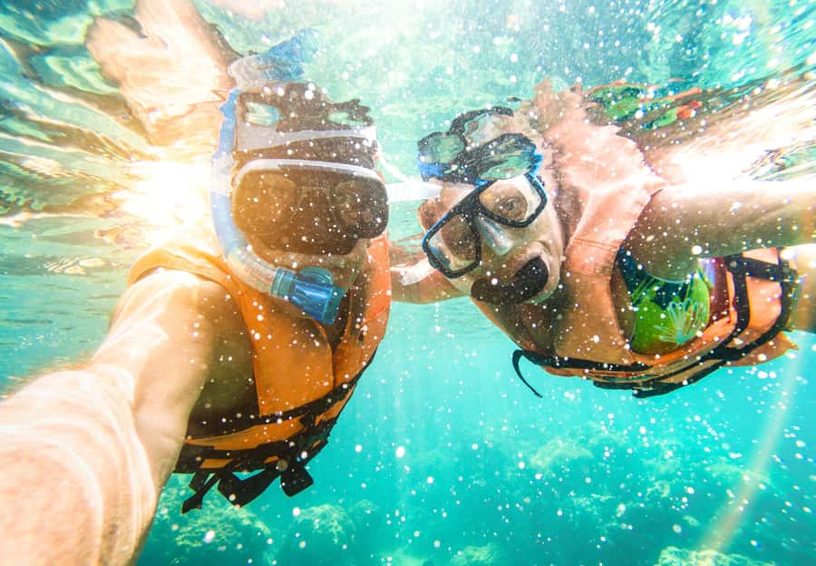 Key West: Dolphin & Reef Snorkel Trip with Sunset Option - Starting out through Key West harbor