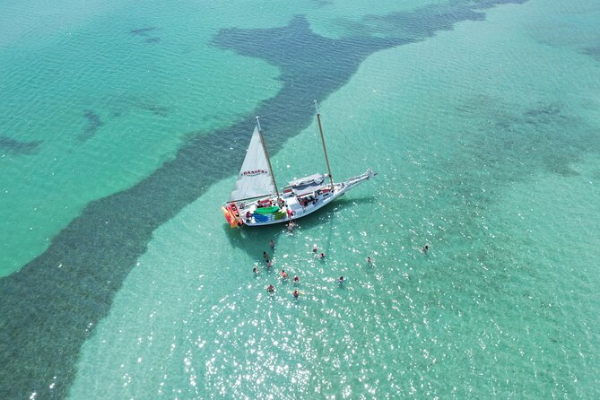 Key West Full-Day Ocean Adventure: Kayak, Snorkel, Sail - Key details that shape the day
