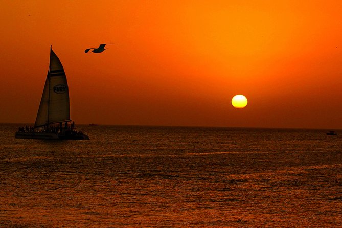 Key West Rum and Reggae: Reef Snorkel Adventure and Sunset Sail - Sailing seven miles to the reef