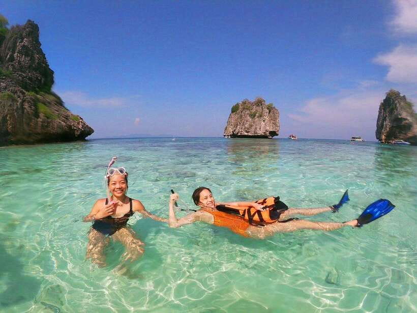 Ko Lanta: Unique 4-Island Long-Tail Snorkeling Tour w/ Lunch - Pickup by open-backed truck and departure from Old Town Pier