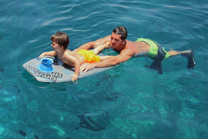 Kona’s Best Morning Snorkel: Captain Cook & Kealakekua Bay - Slides, jump platform, and choices for non-snorkelers