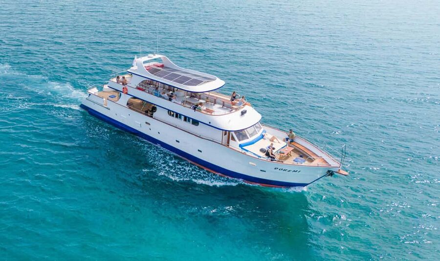Larnaca Bay Cruise with Snorkeling - Leaving Larnaca Marina with Finikoudes and the Medieval Castle