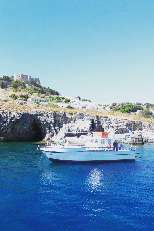 Lindos,Pefkos: All inclusive Swim & Snorkel Boat Cruise - First stop: swimming into a Lindos sea cave