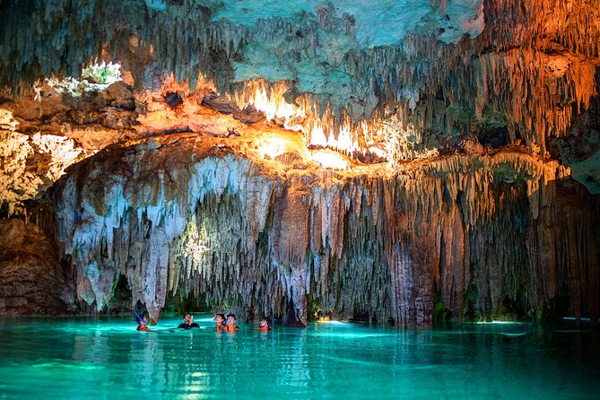 Magical Cenote and Paradise Lagoon Snorkeling Adventure - Entering the cenote