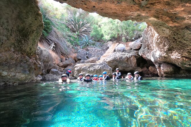 Mallorca: Kayaking, Sea Cave, Cliff Jumping & Snorkel Tour - Entering the sea cave and finding the key