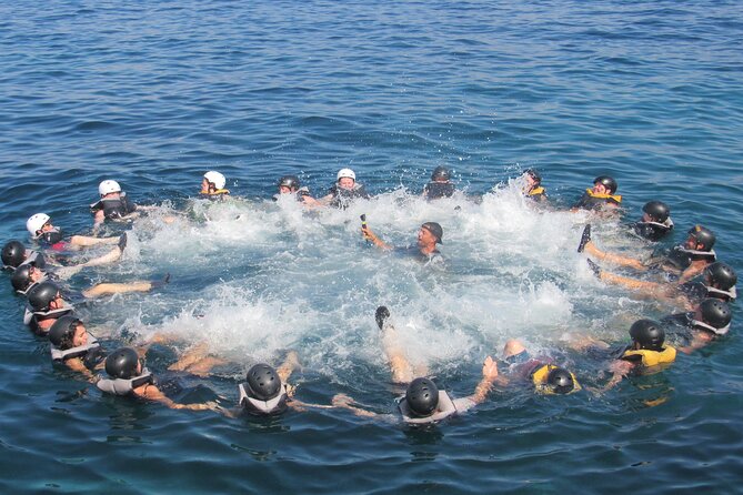 Mallorca: Kayaking, Sea Cave, Cliff Jumping & Snorkel Tour - The coastal trek and optional cliff jump