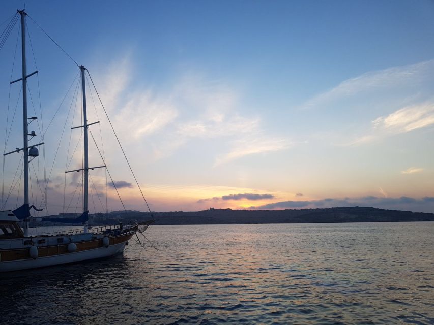 Malta: Blue Lagoon Evening Swim & Snorkel Boat Cruise - Leaving Bugibba Jetty and crossing toward Comino