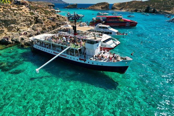 Malta: Comino, Blue Lagoon & Caves - swim, snorkel & slide - The day begins at Bugibba Jetty at 10am